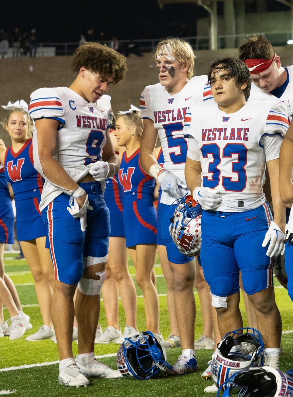 From left, Westlake's Jaden Greathouse, Keaton Kubecka and Jack Kayser absorb the loss to North Shore in the state semifinals.