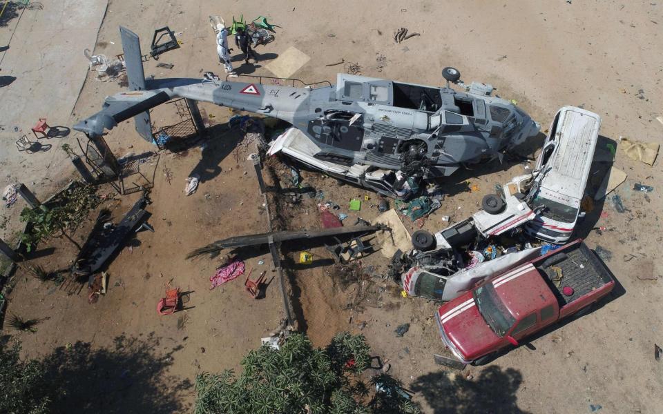 View of the military helicopter that fell on a van in Santiago Jamiltepec, Oaxaca state - AFP
