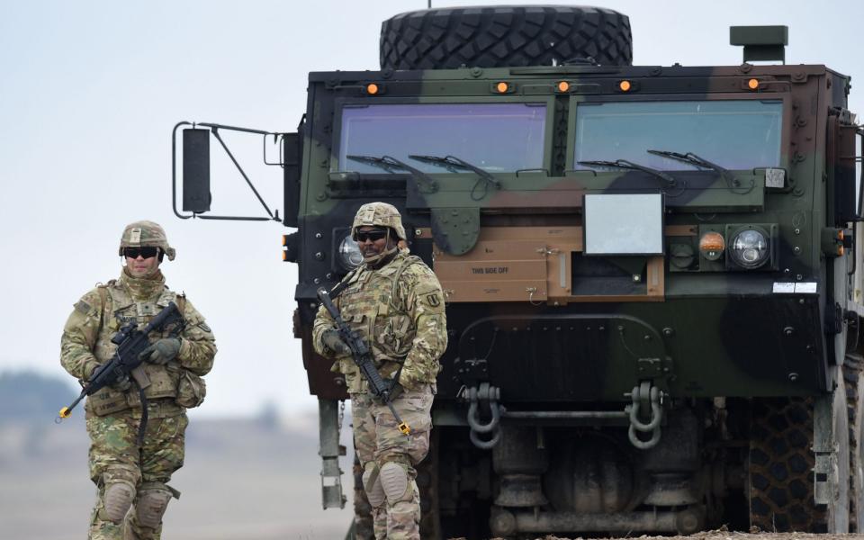 US soldiers patrol prior to an artillery live fire event by the US Army Europe's 41st Field Artillery Brigade at the military training area in Grafenwoehr, southern German - AFP