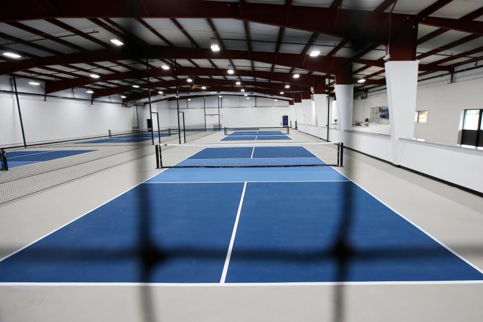 Interior view of the newly opened Southcoast Pickleball indoor courts in Fairhaven.