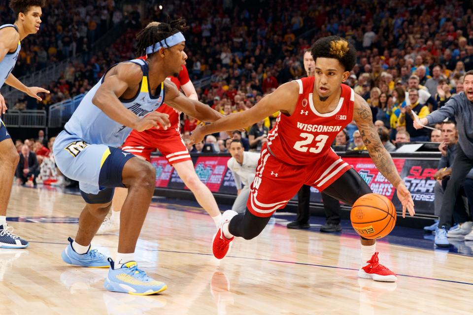 Wisconsin Badgers guard Chucky Hepburn (23) drives for the basket during the first half against the Marquette Golden Eagles at Fiserv Forum in their Dec. 3, 2022, game.