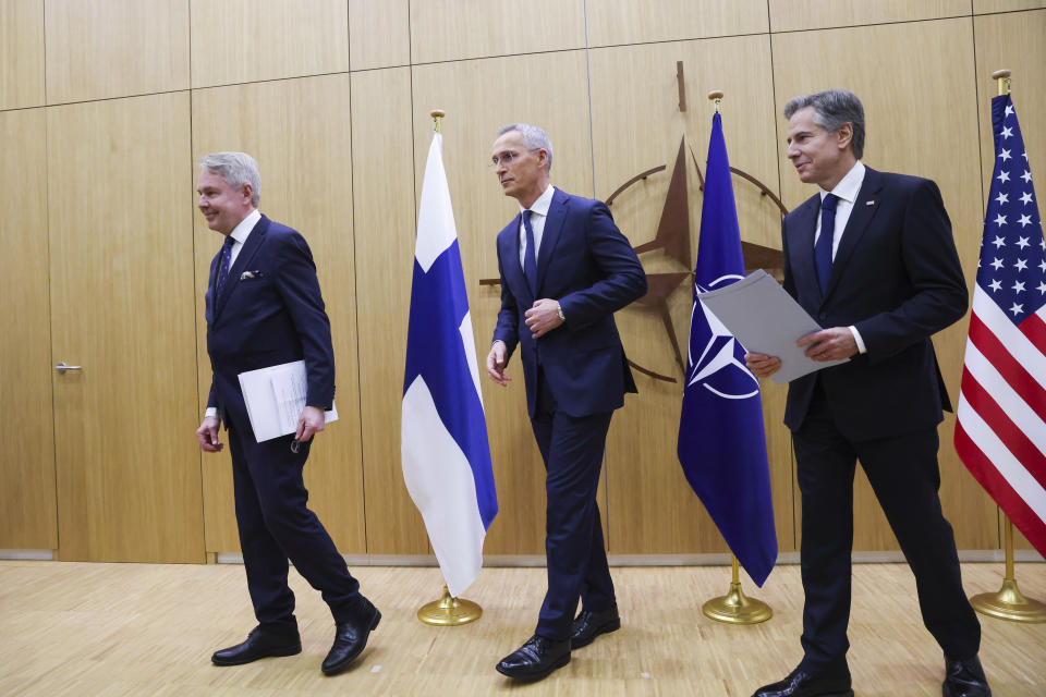 NATO Secretary General Jens Stoltenberg, center, Finnish Foreign Minister Pekka Haavisto, left, and United States Secretary of State Antony Blinken leave the room after a ceremony to hand over Finland's accession document on the sidelines of a meeting of NATO foreign ministers at NATO headquarters in Brussels, Tuesday, April 4, 2023. Finland joined the NATO military alliance on Tuesday, dealing a major blow to Russia with a historic realignment of the continent triggered by Moscow's invasion of Ukraine. (Johanna Geron, Pool Photo via AP)