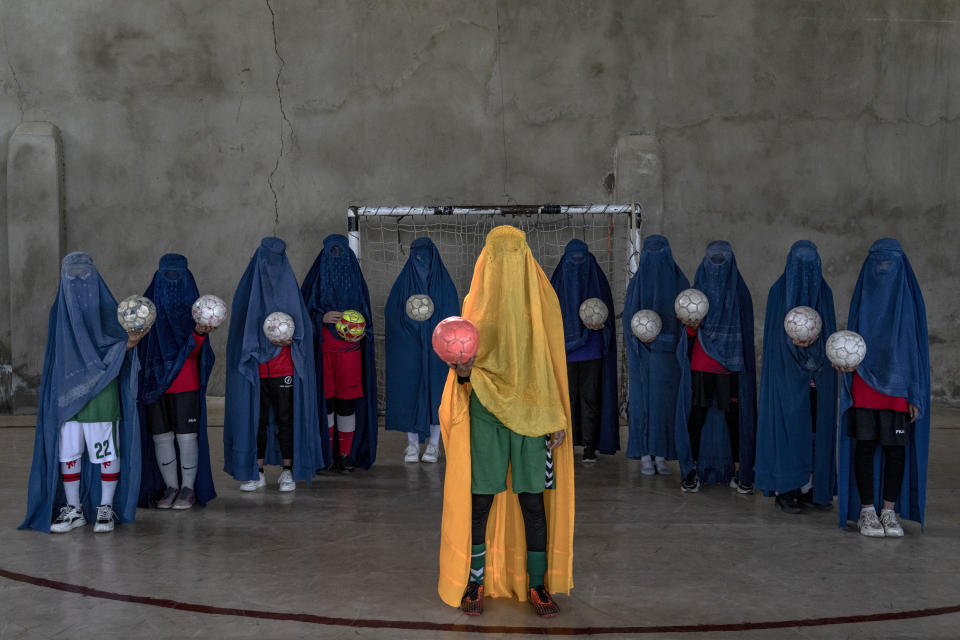 FILE - An Afghan women's soccer team poses for a photo in Kabul, Afghanistan, Thursday, Sept. 22, 2022. (AP Photo/Ebrahim Noroozi, File)