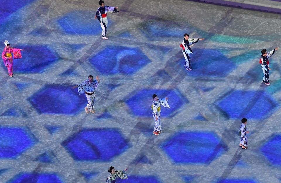 <p>Performers dance during the closing ceremony of the Tokyo 2020 Olympic Games, at the Olympic Stadium, in Tokyo, on August 8, 2021. (Photo by Antonin THUILLIER / AFP) (Photo by ANTONIN THUILLIER/AFP via Getty Images)</p> 