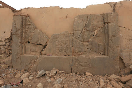 Remains of wall panels and colossal statues of winged bulls, destroyed by Islamic State militants are seen in the Assyrian city of Nimrud eastern bank of the Tigris River, south of Mosul, Iraq, November 16, 2016. REUTERS/Ari Jalal