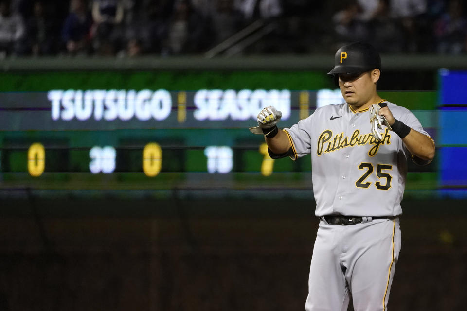 Pittsburgh Pirates' Yoshi Tsutsugo celebrates his two-run double during the fifth inning of the team's baseball game against the Chicago Cubs on Thursday, April 21, 2022, in Chicago. (AP Photo/Charles Rex Arbogast)
