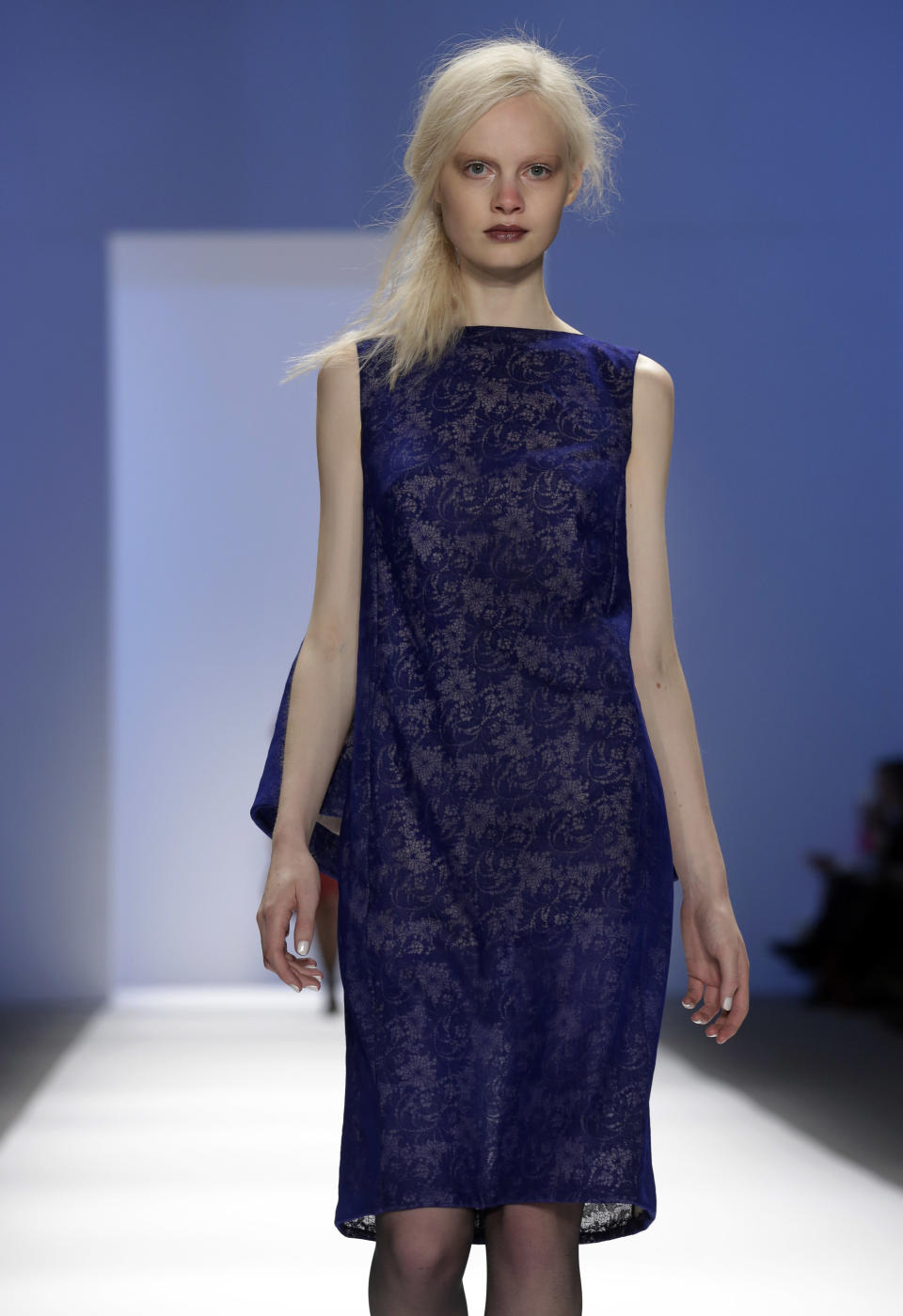 The Tadashi Shoji Fall 2013 collection is modeled during Fashion Week in New York on Thursday, Feb. 7, 2013. (AP Photo/Richard Drew)