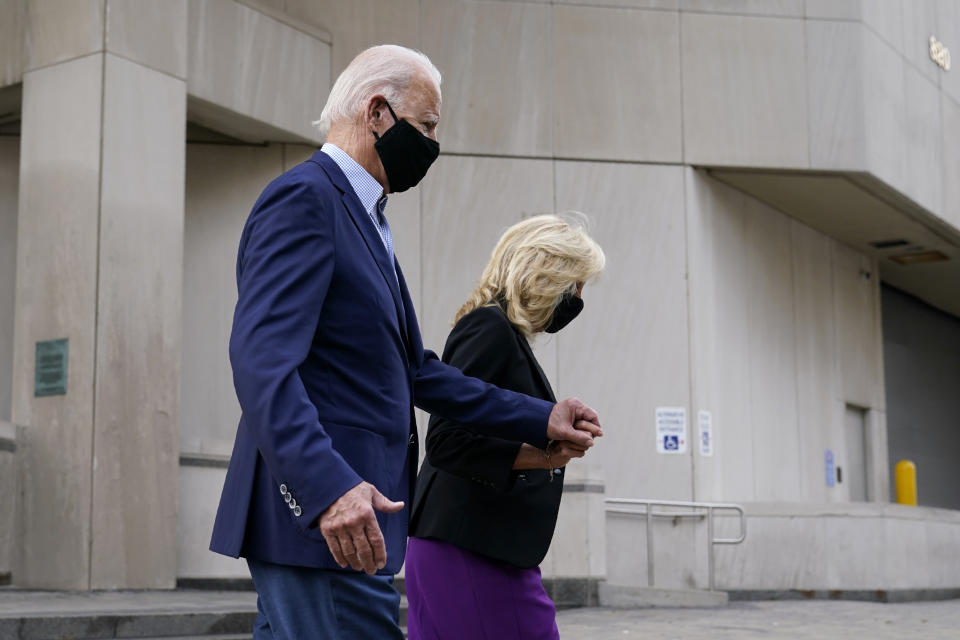 Democratic presidential candidate and former Vice President Joe Biden and his wife Jill Biden depart after voting early in Delaware's state primary election at the New Castle County Board of Elections office in Wilmington, Del., Monday, Sept. 14, 2020. (AP Photo/Patrick Semansky)