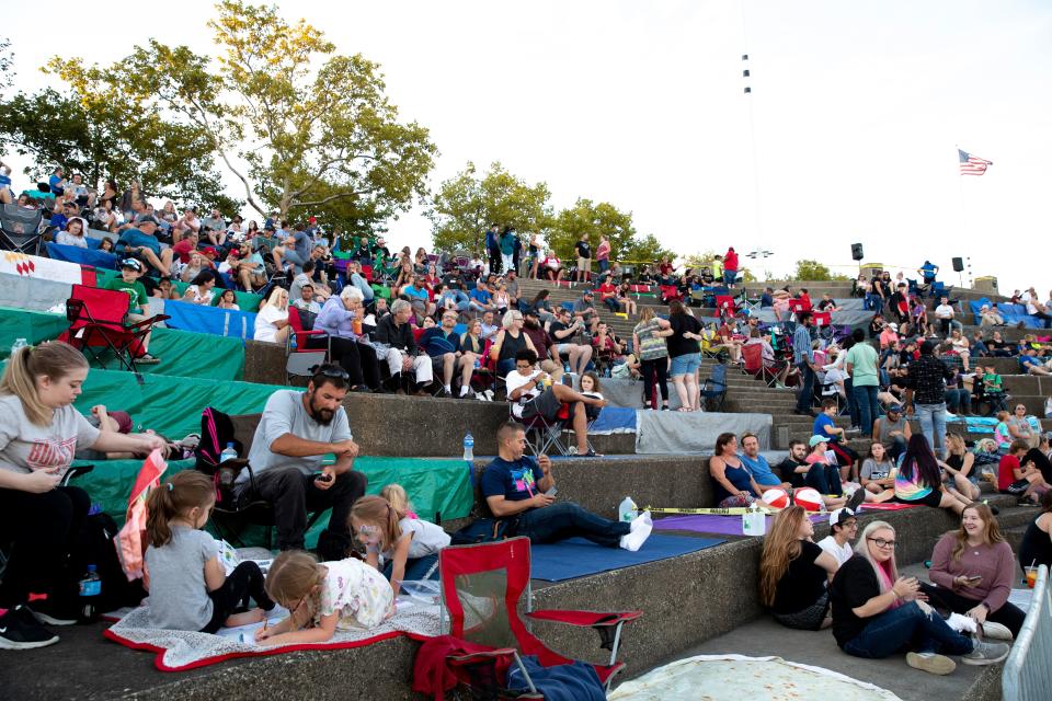 People wait for the Western & Southern/WEBN fireworks show at Riverfest on Sunday, Sept. 5, 2021, at  Sawyer Point and Yeatman's Cove in Cincinnati. 