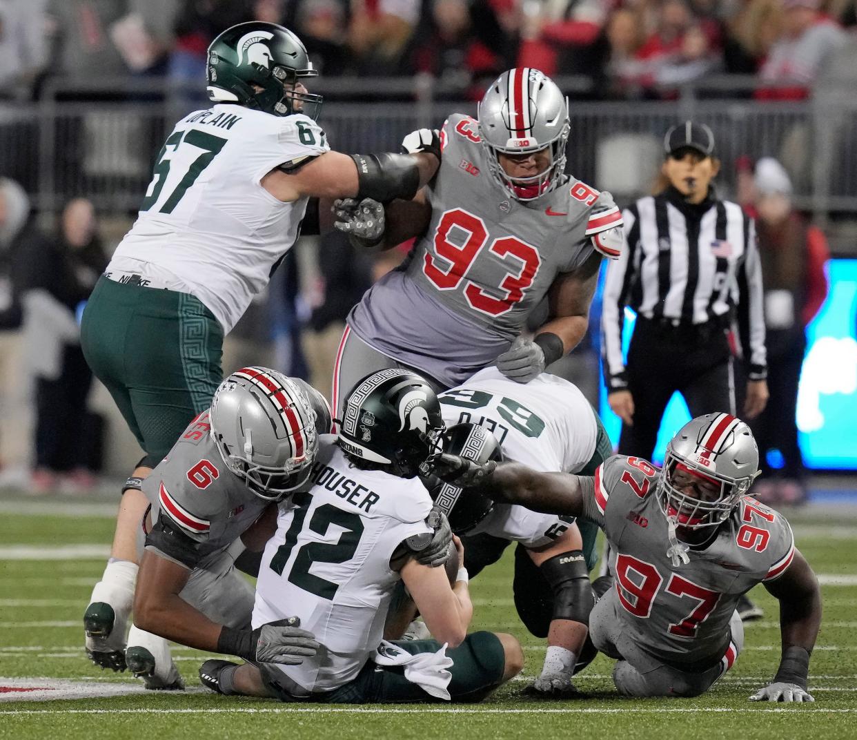 Nov. 11, 2023; Columbus, Oh., USA; 
Ohio State Buckeyes safety Sonny Styles (6) sacks Michigan State Spartans quarterback Katin Houser (12) during the first half of Saturday's NCAA Division I football game against the Michigan State Spartans.