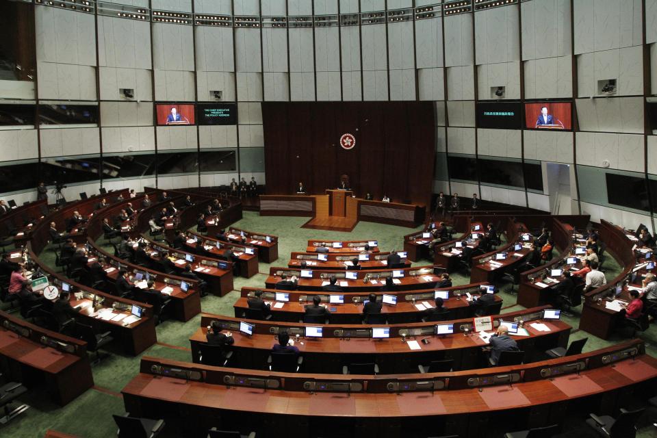 Hong Kong Chief Executive Donald Tsang delivers his last policy speech at the new Legislative Council building in Hong Kong Wednesday, Oct. 12, 2011. Hong Kong will resume a program to sell thousands of affordable apartments a year, the city's leader said Wednesday as he unveiled a key measure in his annual policy speech aimed at cooling public anger over the city's widening rich-poor gap. (AP Photo/Kin Cheung)