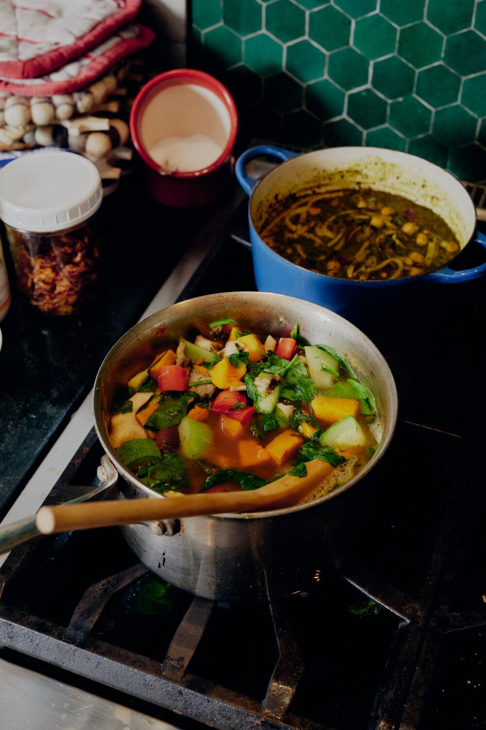 Dishes and cooking of soup in Michelle Huneven's kitchen.