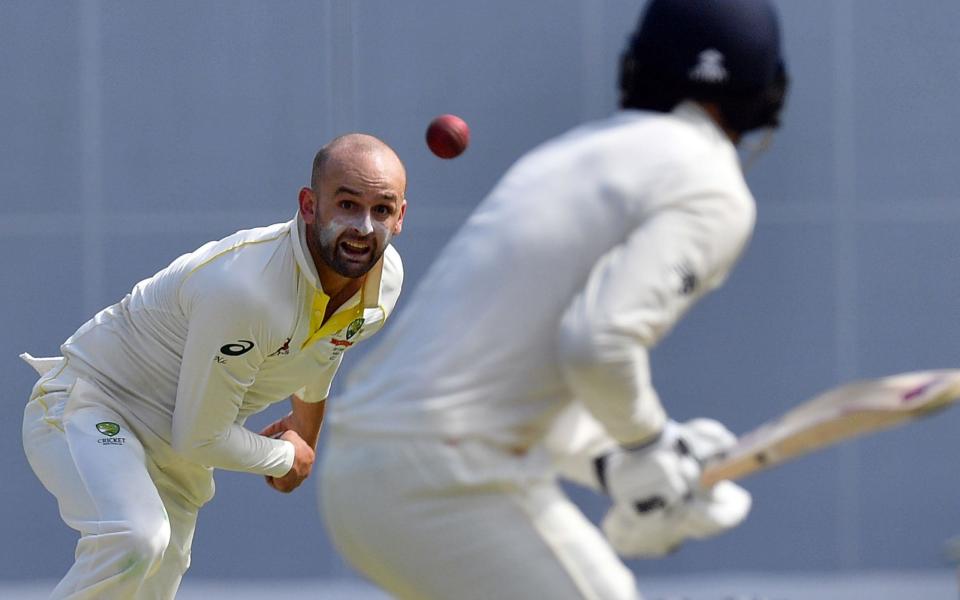 Tough Test: Nathan Lyon bowls to James Vince, the stand-out performers on day one - AFP