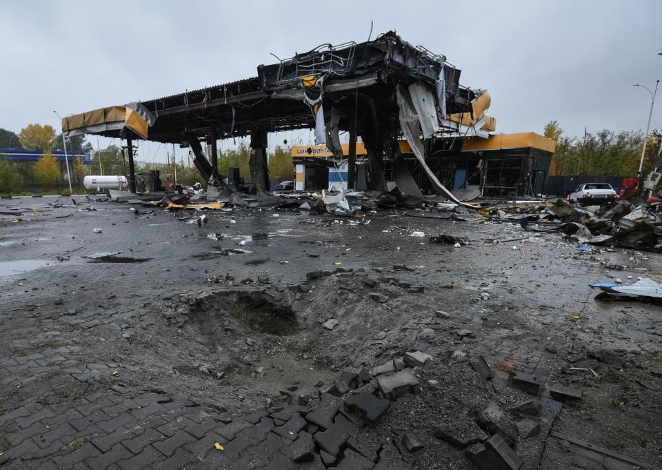 Petrol station destroyed by yesterday’s strike (Reuters)