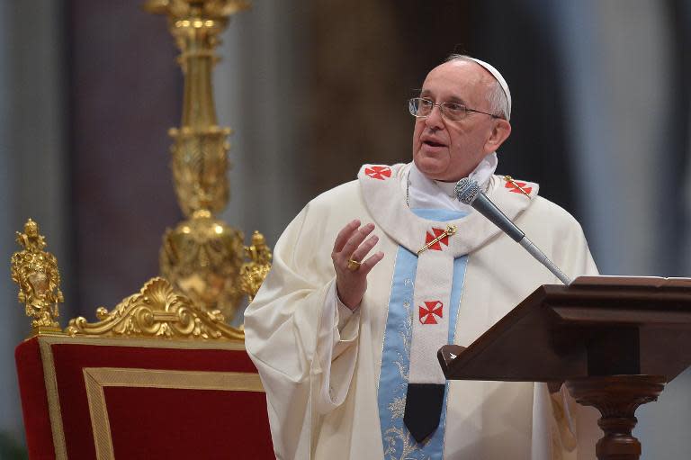 Pope Francis leads a mass at St Peter's Basilica at the Vatican on January 1, 2014