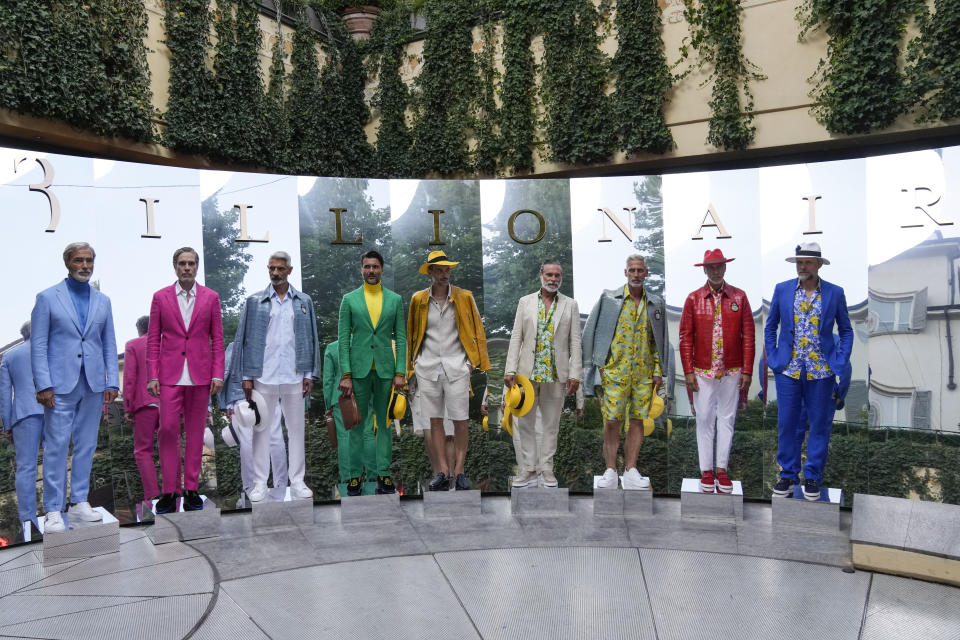 Model wear creations as part of the Billionaire men's Spring Summer 2023 collection presented in Milan, Italy, Friday, June 17, 2022. (AP Photo/Luca Bruno)