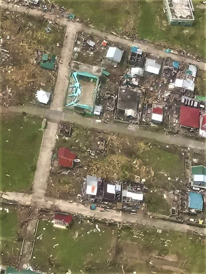 In this photo provided by the Philippine Coast Guard, damaged homes are seen at Catanduanes province, eastern Philippines in this aerial photo on Monday Nov. 2, 2020. At least 16 people were killed as Typhoon Goni lashed the Philippines over the weekend, and about 13,000 shanties and houses were damaged or swept away in the eastern island province that was first hit by the ferocious storm, officials said Monday. (Philippine Coast Guard via AP)