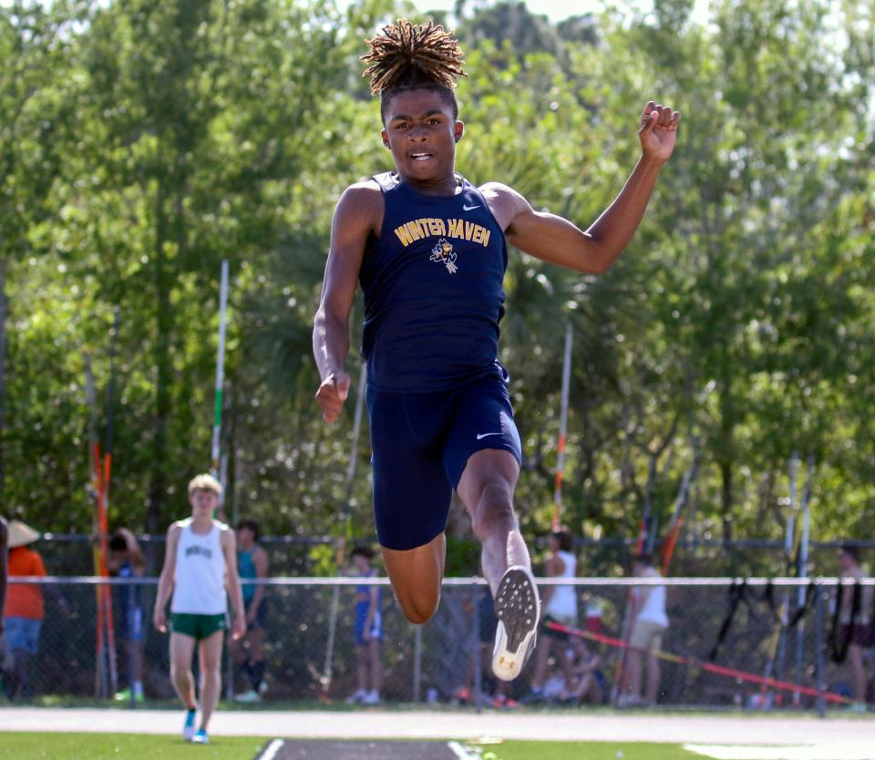 Winter Haven's Jaden Lippett competes in the long jump at the Class 4A, Region 2 track and field meet in May. He won the event and went on to win the triple jump.