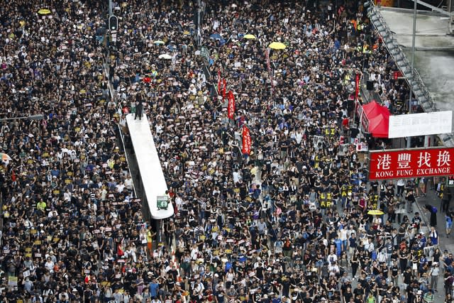 Protesters march in Hong Kong
