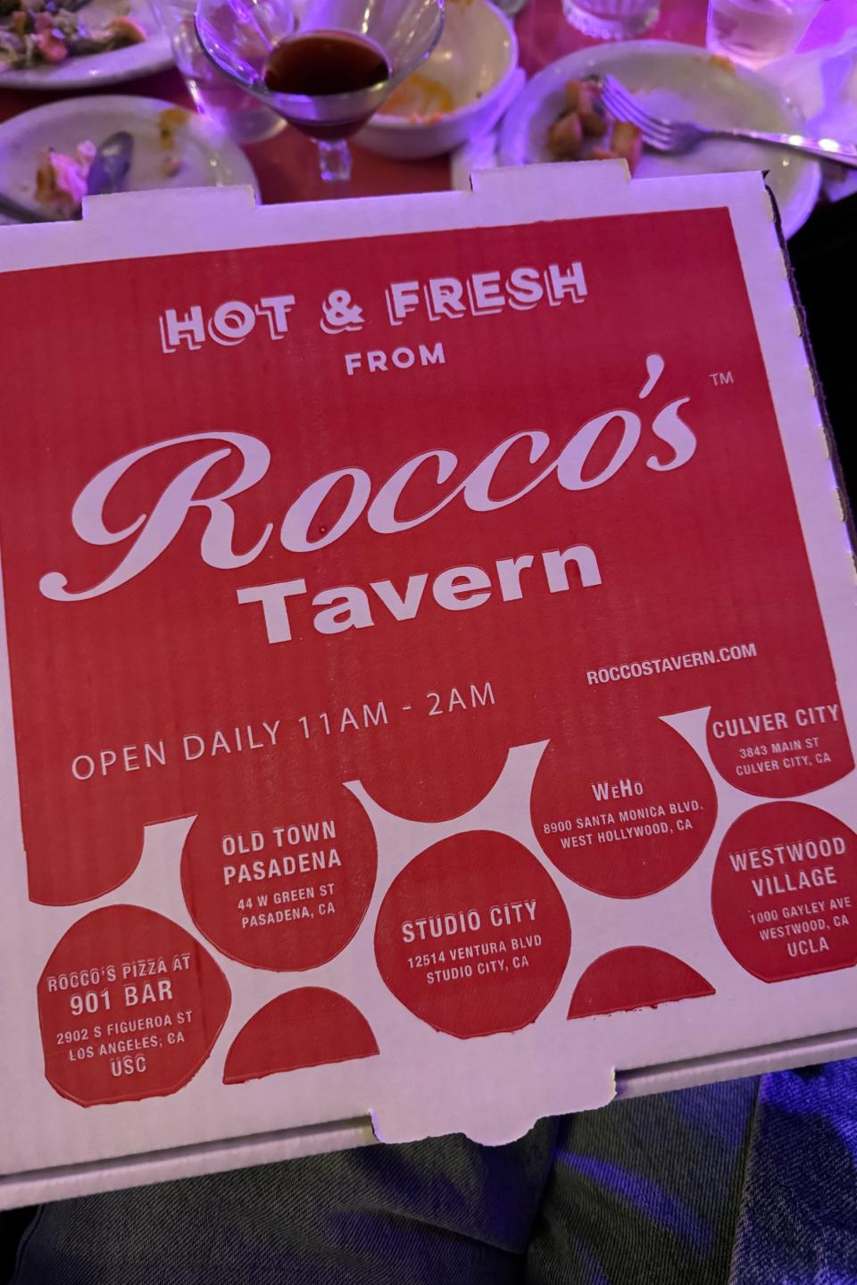 Menu cover for Rocco's Tavern, detailing locations and operating hours