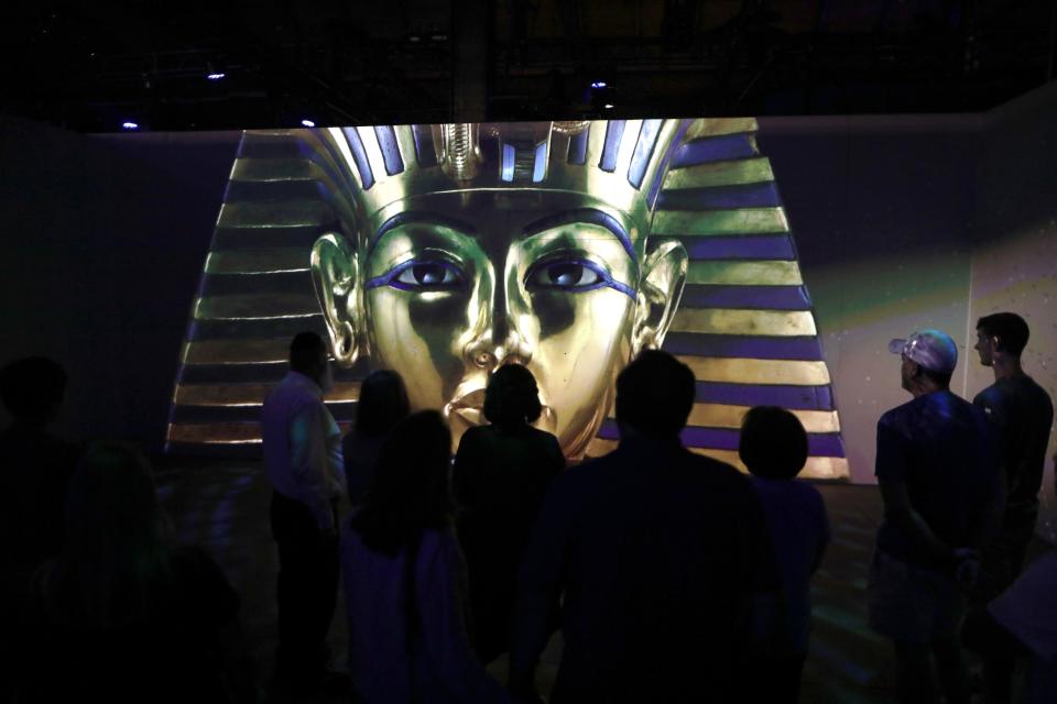 Guests attend "Beyond King Tut: The Immersive Experience" at the SoWa Power Station in Boston on July 8, 2022.