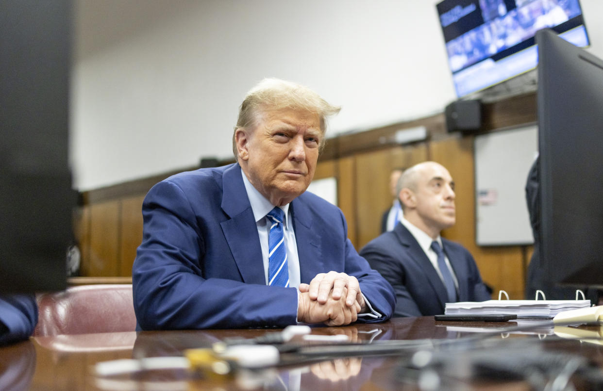 Former President Donald Trump awaits the start of proceedings on the second day of jury selection at Manhattan criminal court, Tuesday, April 16, 2024, in New York. Donald Trump returned to the courtroom Tuesday as a judge works to find a panel of jurors who will decide whether the former president is guilty of criminal charges alleging he falsified business records to cover up a sex scandal during the 2016 campaign. (Justin Lane/Pool Photo via AP)