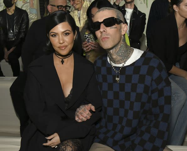 <p>Getty</p> Kourtney Kardashian and Travis Barker in Los Angeles in February 2022