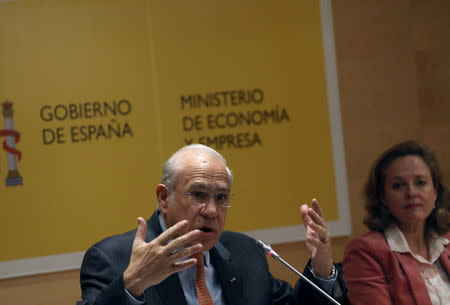 Organisation for Economic Cooperation and Development (OECD) Secretary-General Angel Gurria and Spain's Economy Minister Nadia Calvino attend a joint news conference in Madrid, Spain, November 22, 2018. REUTERS/Susana Vera