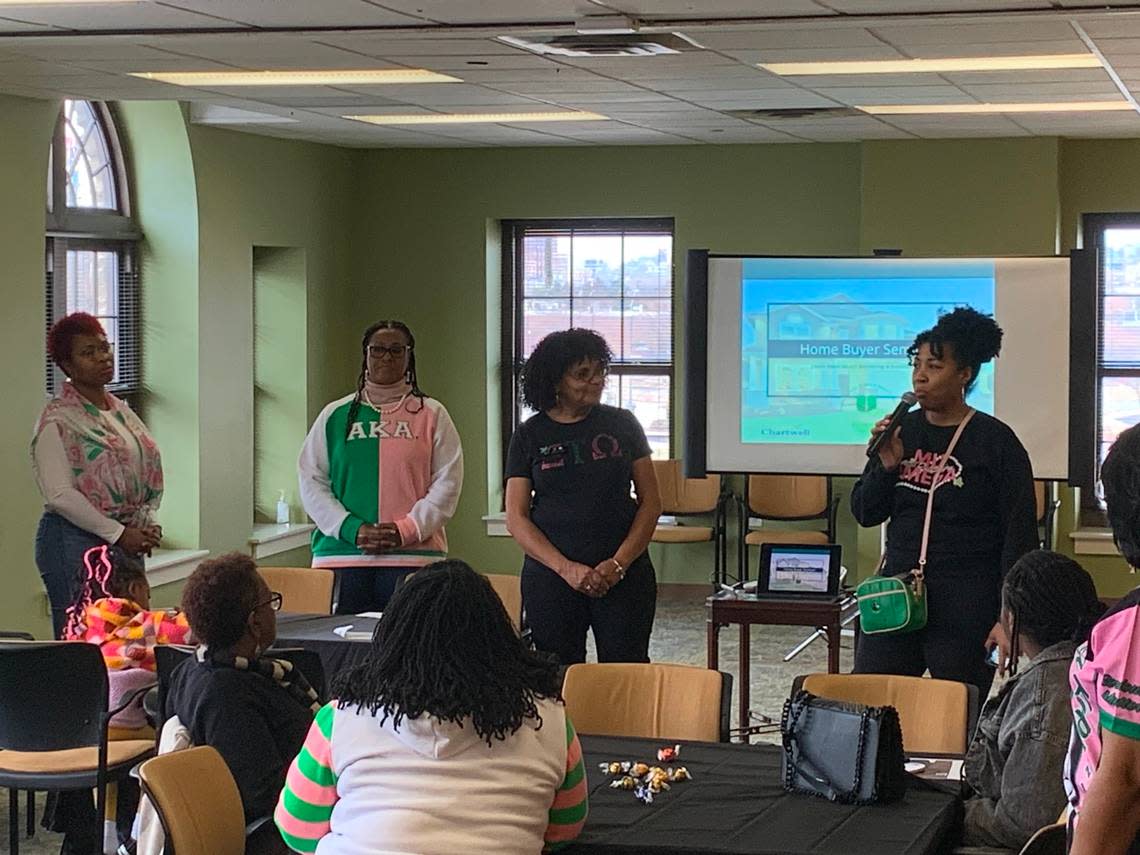 Meredyth Vick, right, president of Alpha Kappa Alpha’s Mu Omega chapter in Kansas City, Kansas, speaks to people gathered for a homebuyer’s seminar Monday, Jan. 16, 2023, at the Black Archives of Mid-America in Kansas City’s historic 18th and Vine district.