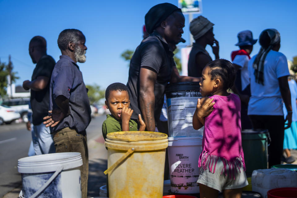 Residents of the township of Soweto, South Africa, queue for water Saturday, March 16, 2024. Thousands of South Africans are lining up for water as the country's largest city, Johannesburg, confronts an unprecedented collapse of its water system affecting millions of people. Residents rich and poor have never seen a shortage of this severity. (AP Photo/Jerome Delay)