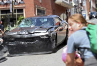 <p>A vehicle reverses after driving into a group of protesters demonstrating against a white nationalist rally in Charlottesville, Va., Saturday, Aug. 12, 2017. (Photo: Ryan M. Kelly/The Daily Progress via AP) </p>