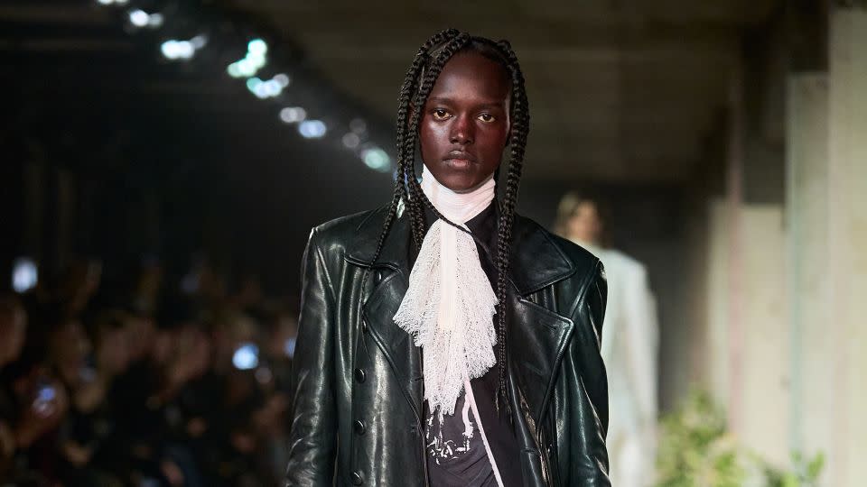 At Ann Demeulemeester, designer Stefano Gallici infused the collection with New Romantic touches — ruffled collars, sheer lace fabrics and , disheveled tailoring. - Francois Durand/Getty Images