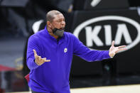 Philadelphia 76ers coach Doc Rivers argues a call during the second half of the team's NBA basketball game against the Cleveland Cavaliers, Thursday, April 1, 2021, in Cleveland. (AP Photo/Ron Schwane)