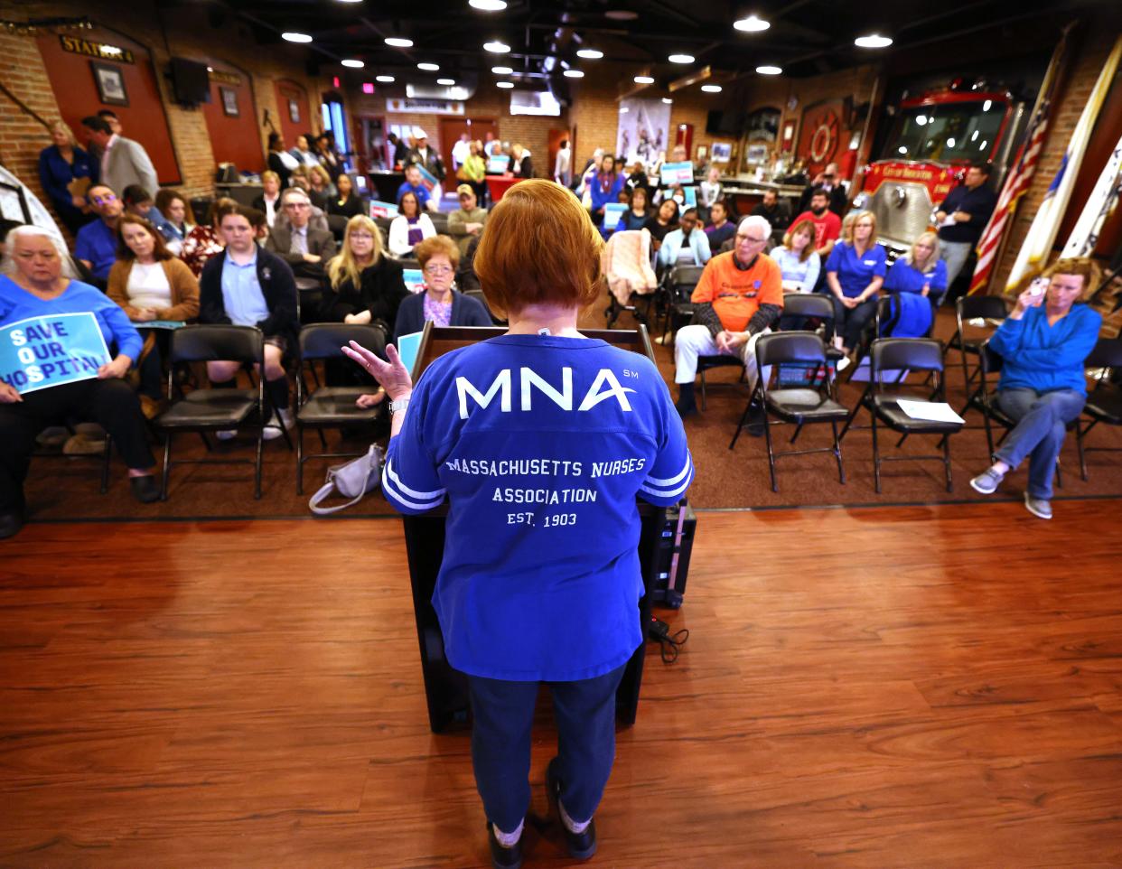 Massachusetts Nurses Association board member Ellen MacInnis speaks at Keating Hall in Brockton during a community rally on Wednesday, April 24, 2024, to keep Good Samaritan Medical Center open amid the financial crisis enveloping its owner, Steward Health Care.