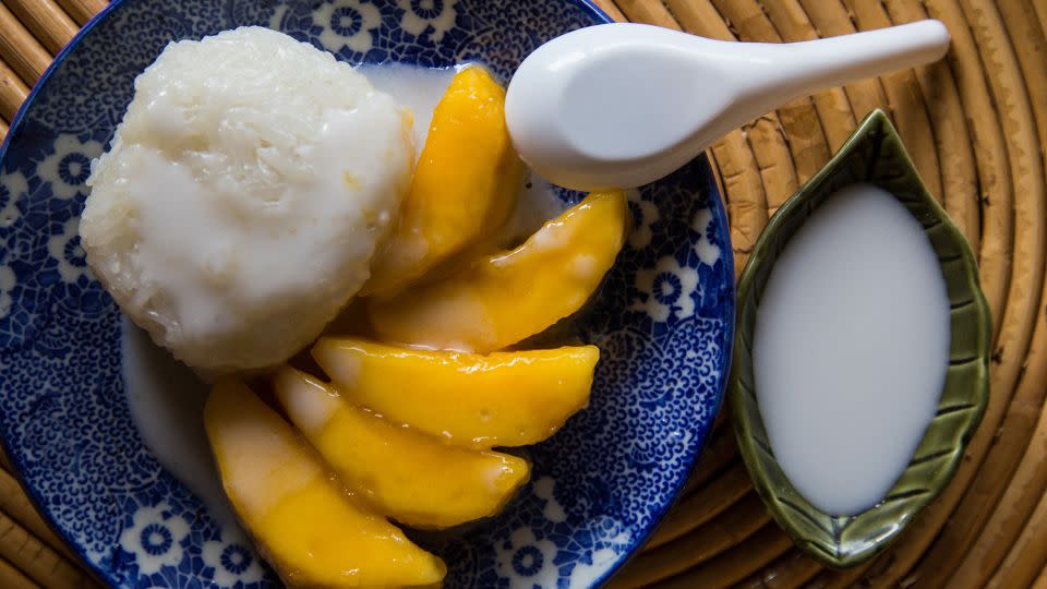 The beloved Thai classic: mango with sticky rice and coconut cream. - John S Lander/LightRocket/Getty Images