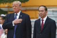 FILE PHOTO: U.S. President Donald Trump (L) and Vietnam's President Tran Dai Quang attend the welcoming ceremony at the Presidential Palace in Hanoi, Vietnam November 12, 2017. REUTERS/Kham/File Photo