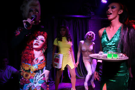 Drag queens perform at a club in Bangkok, Thailand March 11, 2018. REUTERS/Athit Perawongmetha