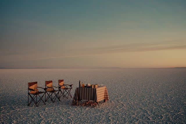 <p>Nick Ballón</p> A sunrise breakfast on the salt flat.