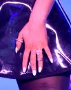 <p>Ari repped her womanhood with a Venus symbol and on the same finger, a cloud to match the tattoo Pete Davidson has the same spot. Like the engagement ring it sits next to, this ink is no longer. </p>