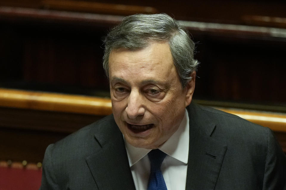 Italian Premier Mario Draghi delivers his speech at the Senate in Rome, Wednesday, July 20, 2022. Draghi was deciding Wednesday whether to confirm his resignation or reconsider appeals to rebuild his parliamentary majority after the populist 5-Star Movement triggered a crisis in the government by withholding its support. (AP Photo/Andrew Medichini)