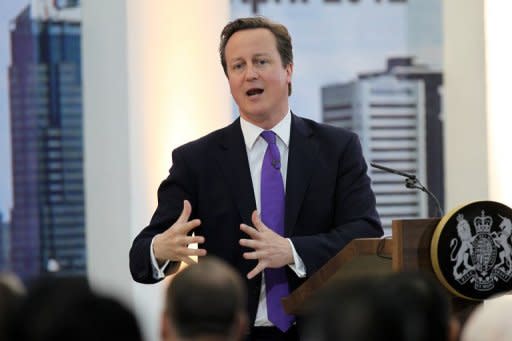 Prime Minister David Cameron speaks at Al-Ashar University in Jakarta. Cameron called on the international community to "get behind" burgeoning reforms in Myanmar ahead of his scheduled historic visit to the country