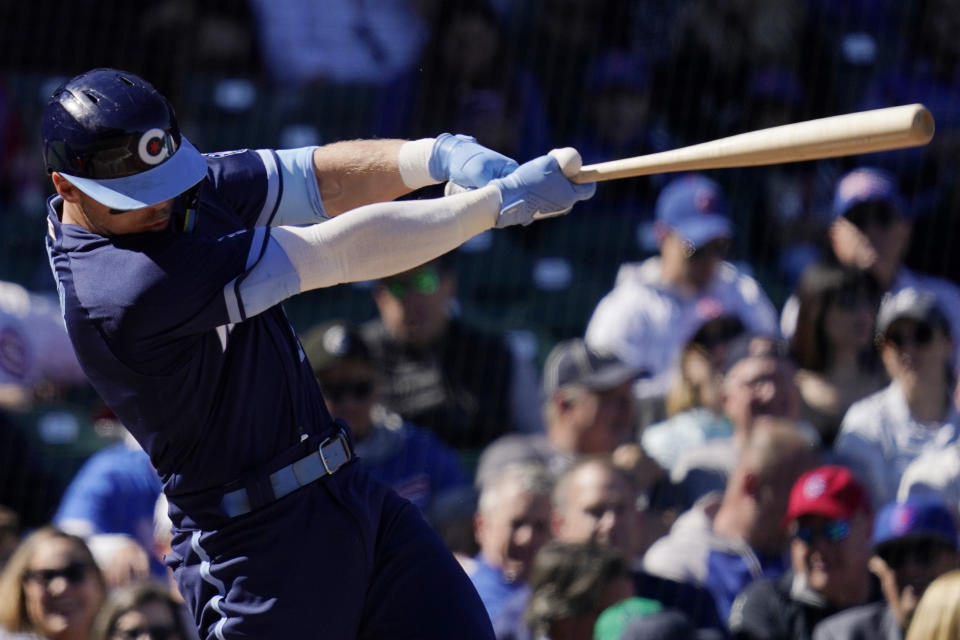 Chicago Cubs' Nico Hoerner hits a two-run double during the second inning of a baseball game against the Cincinnati Reds in Chicago, Friday, Sept. 30, 2022. (AP Photo/Nam Y. Huh)