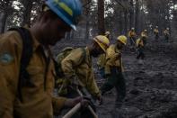 The Wider Image: Oregon inmates find redemption in fighting wildfires