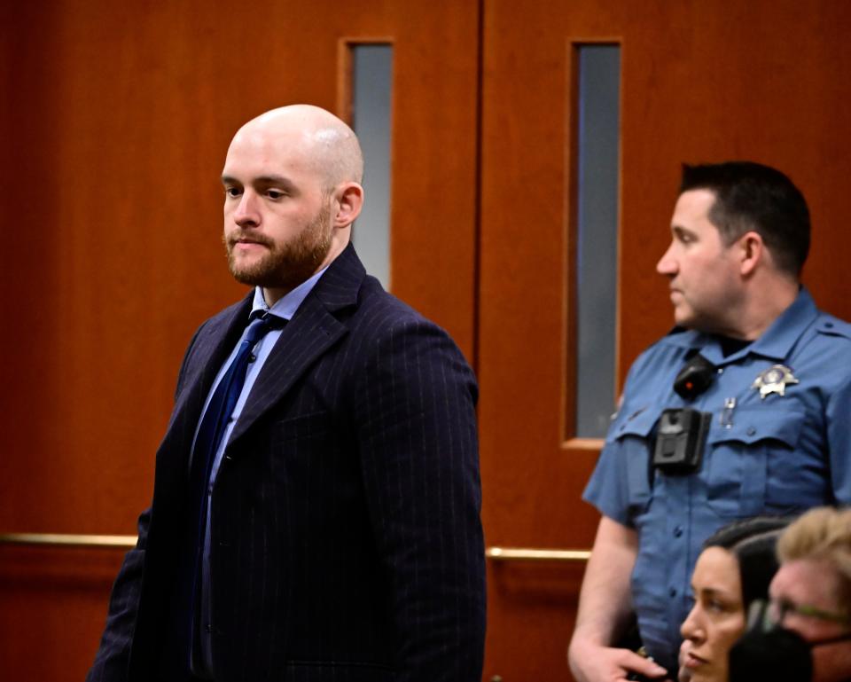 Former Aurora Police officer Jason Rosenblatt attends an arraignment at the Adams County Justice Center in Brighton, Colo., on Friday, Jan. 20, 2023. Aurora Police officers Nathan Woodyard, Randy Roedema and former officer Jason Rosenblatt along with paramedics Jeremy Cooper and Peter Cichuniec were indicted by a Colorado state grand jury in 2021 on 32 combined accounts related to Elijah McClain's arrest and death in August 2019. (Andy Cross/The Denver Post via AP)