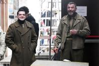 <p>Costars Josh Hutcherson and Liev Schreiber take five on Tuesday on the Venice, Italy, set of <em>Across the River and Into the Trees.</em></p>