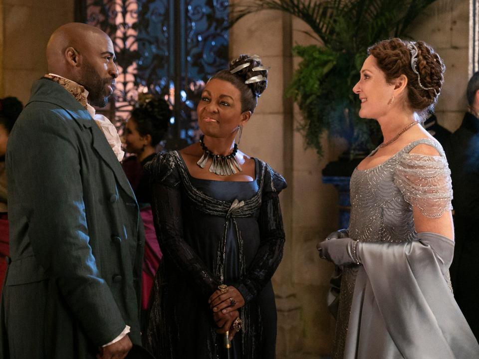 Daniel Francis as Lord Anderson, Adjoa Andoh as Lady Danbury, and Ruth Gemmell as Lady Violet Bridgerton on season three, episode four of "Bridgerton."