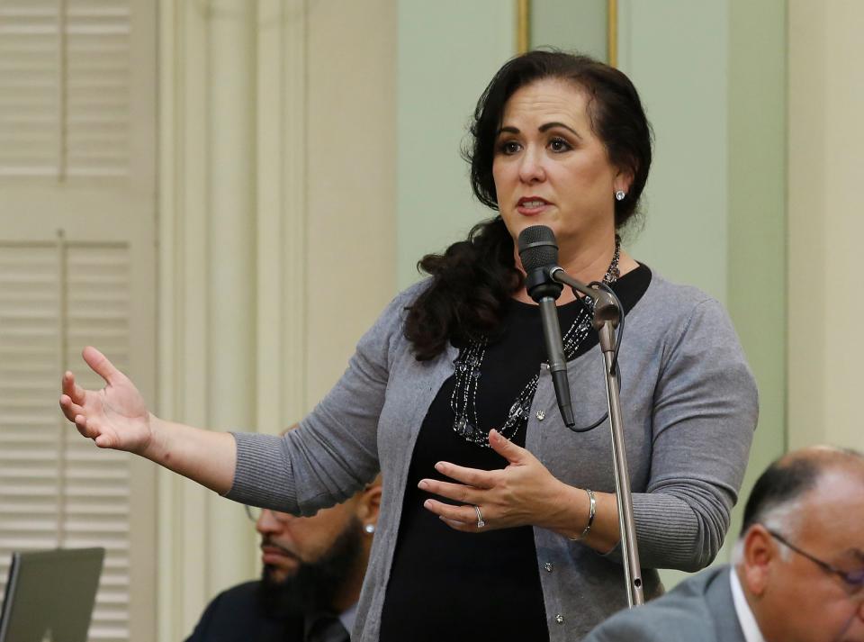 California Assemblywoman Lorena Gonzalez speaks during a session of the Assembly that passes her bill, AB 5, which aims to reclassify gig economy workers such as Uber and Lyft drivers as employees. Workers say they need to earn more, while companies such as Uber argue that such a reclassification could put their companies in financial jeopardy.