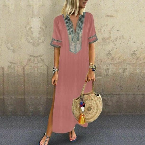 <a href="https://www.walmart.com/ip/Multitrust-Womens-Sleeveless-Boho-Casual-Linen-Kaftan-Maxi-Dress-Long-Dresses/423941292" target="_blank" rel="noopener noreferrer"><strong>Get the Multitrust boho linen kaftan from Walmart, $13.48</strong></a>