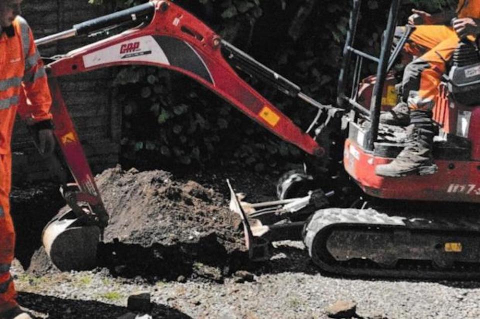 Frank was awoken to find workmen digging up his garden. See SWNS story SWLSdig. A pensioner has been left furious after bungling workmen barricaded him inside his own home when they dug a trench in his garden and driveway. Frank Farmer, 67, was woken up to the sound of diggers tearing up his lawn and patio outside his home in the village of Claines, Worcs. Frank Farmer, of Claines, has spoken about his 