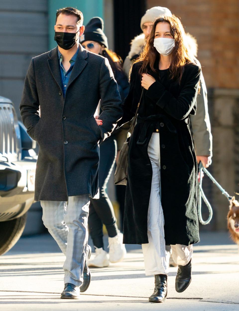 <p>Katie Holmes and boyfriend Emilio Vitolo Jr. share laughs and enjoy their walk together through N.Y.C on Sunday.</p>